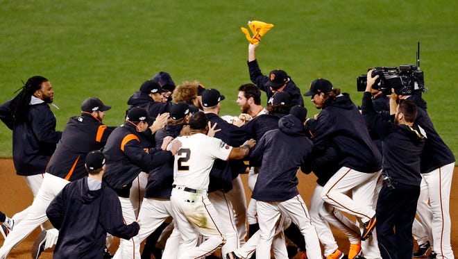 NLDS, Game 3: Joe Panik  hits a walk-off RBI double in the 13th inning to give the Giants a 6-5 win.