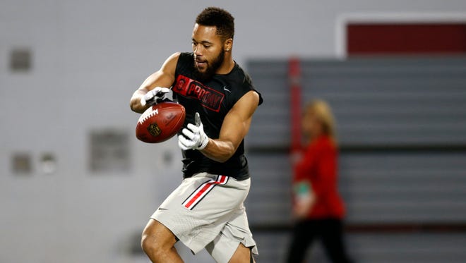 Cornerback Marshon Lattimore makes a catch while running a drill during pro day at Ohio State University in Columbus, Ohio, Thursday, March 23, 2017.