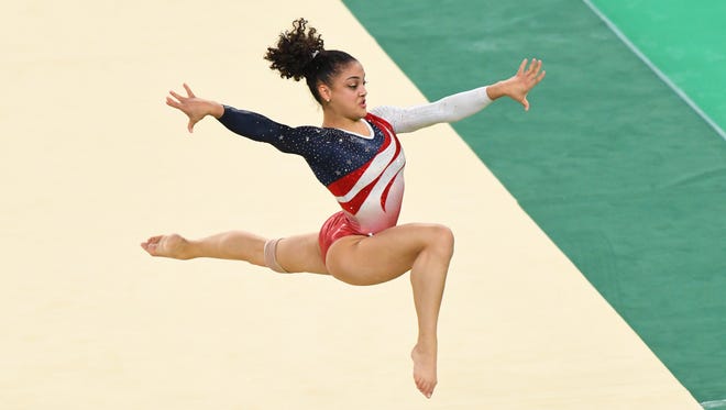 Aug. 9: American Laurie Hernandez wows the crowd with her floor routine during the women's gymnastics team final. Hernandez and her Final Five teammates left their mark on the Games, dominating the field to win the gold medal.