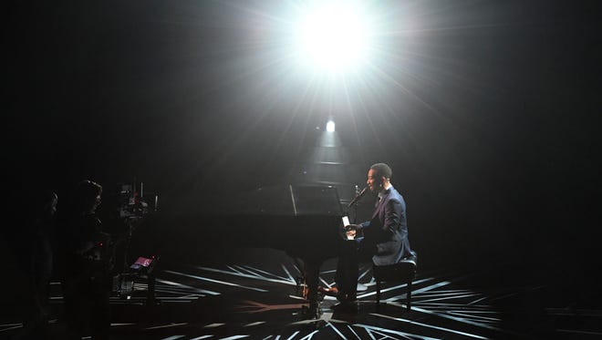 John Legend sings a medley of the oscar nominated songs from 'La La Land' during the 89th Academy Awards.