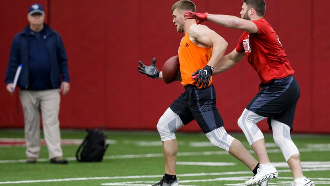 Former Wisconsin linebacker T.J. Watt, left, makes a reception against former Wisconsin linebacker Vince Biegel during drills at the Wisconsin's Pro Day Wednesday, March 15, 2017, in Madison, Wis.