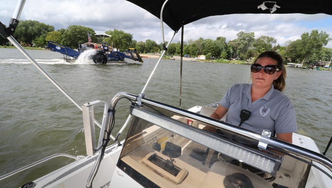Muskego Police Officer Erin Cortese powers up to patrol on Little Muskego Lake on Aug. 16. The boat patrol is one of the little known aspects of the Muskego Police Department.