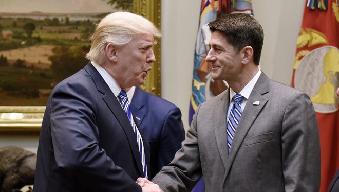 President Trump shakes hands with Ryan before a meeting in the Roosevelt Room of the White House on June 6, 2017.
