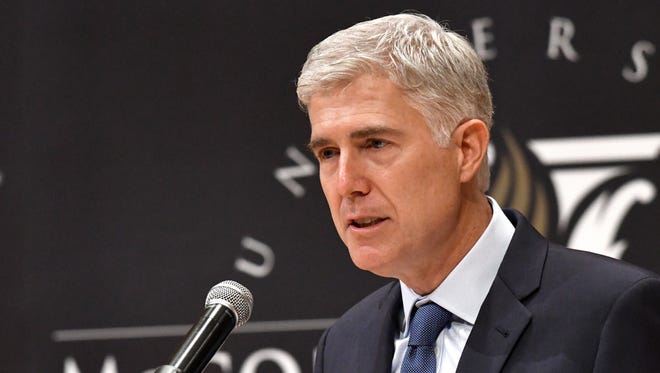 Gorsuch speaks to an audience as a guest of Senate Majority Leader Mitch McConnell at the University of Louisville on Sept. 21, 2017, in Louisville, Ky.