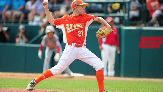 Texas pitcher Chip Buchanan delivers during the first inning.