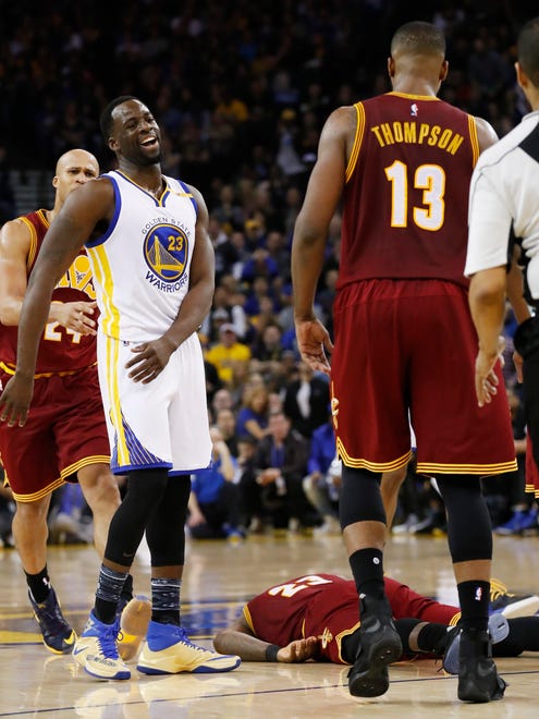 Draymond Green reacts after being called for a foul on Cleveland Cavaliers forward LeBron James.