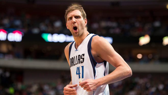 2016: Dallas Mavericks forward Dirk Nowitzki argues a call with the referees.