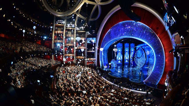 Candy and snacks are delivered by parachute from  the ceiling during the 89th Academy Awards.