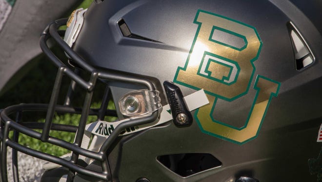 A detailed view of a Baylor Bears helmet before the game between the Bears and the West Virginia Mountaineers at McLane Stadium. The Bears defeat the Mountaineers 62-38.