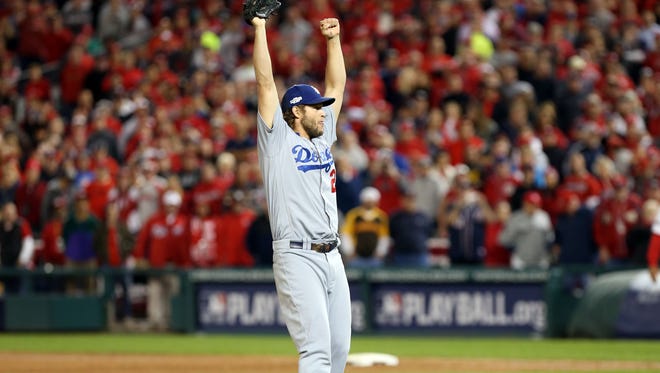 NLDS, Game 5: Clayton Kershaw retires the last two Nationals and earns the first save of his career.