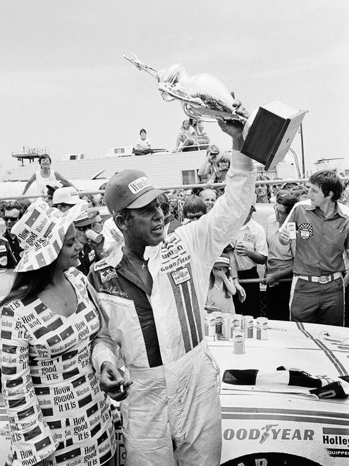David Pearson, celebrating at Daytona International Speedway in 1974, won three championships (1966, '68, '69). Pearson hails from Spartanburg, S.C.