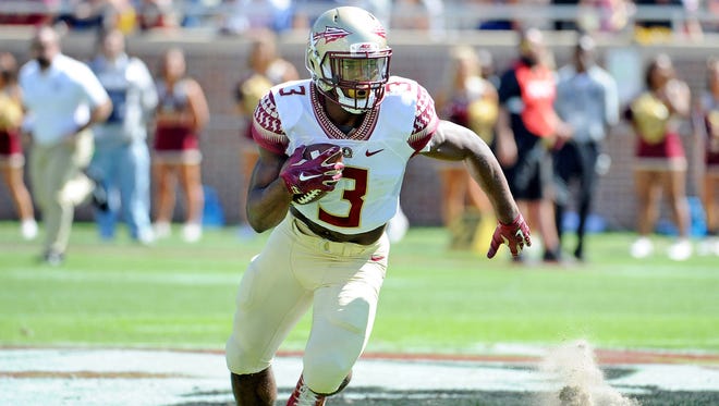 Florida State running back Cam Akers runs the ball during the first half of the team's spring game.