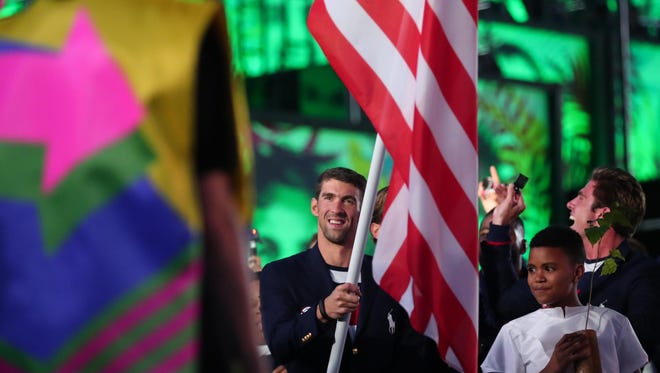 Michael Phelps leads the U.S. team into the stadium during the opening ceremony of the Rio Games.