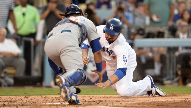 NLCS, Game 4: Dodgers' Adrian Gonzalez is called out by home plate umpire in the second inning. The Dodgers challenge the call, but it is upheld.