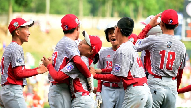 Japan celebrates after winning its fifth Little League World Series title in the last eight years.