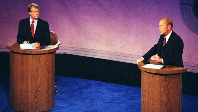 Gerald Ford speaks during the first of three televised debates with Jimmy Carter at Philadelphia's Walnut Street Theater on Sept. 23, 1976.