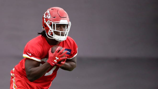 Kansas City Chiefs running back Kareem Hunt (27) participates in a drill during the team's organized team activity at its NFL football training facility Wednesday, May 24, 2017, in Kansas City, Mo.