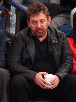 Madison Square Garden chairman James Dolan (center) watches during the third quarter between the New York Knicks and the Milwaukee Bucks at Madison Square Garden.