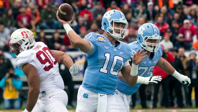 Former North Carolina QB Mitchell Trubisky (10) and ex-Stanford DE Solomon Thomas (90) seem to be potential No. 2 picks in the 2017 NFL draft.