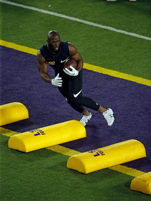 LSU running back Leonard Fournette runs through drills during their NCAA college football pro day drills in Baton Rouge, La., Wednesday, April 5, 2017.