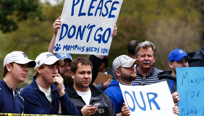 March 31, 2009 - Memphis fans gather outside coach John Calipari's house in East Memphis Tuesday afternoon in a last ditch effort to keep the coach from leaving for Kentucky.