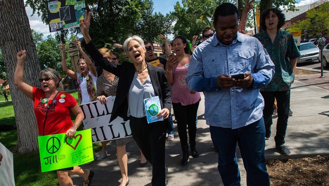 Stein marches with supporters on Aug. 27, 2016, through Acacia Park in Colorado Springs, Colo., to the All Souls Unitarian Universalist Church.