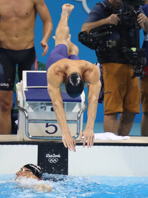 Michael Phelps swam the anchor leg of the men's 4x200 freestyle relay.