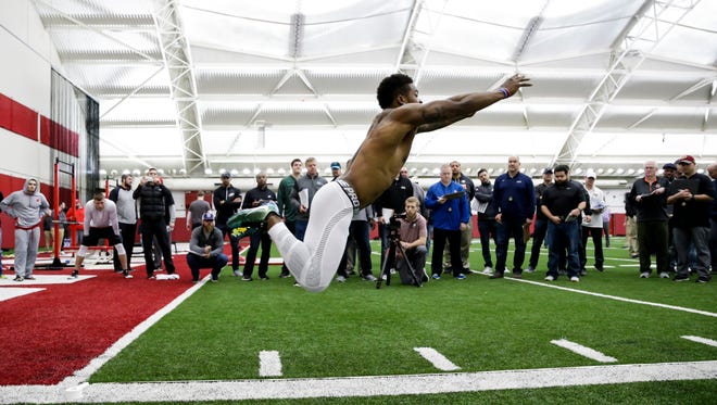 Former Wisconsin running back Corey Clement runs drills during the Wisconsin's Pro Day Wednesday, March 15, 2017, in Madison, Wis.