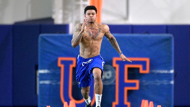 Defensive back Teez Tabor runs the 40-yard dash during Florida's NFL Pro Day in Gainesville, Fla., Tuesday, March 28, 2017.