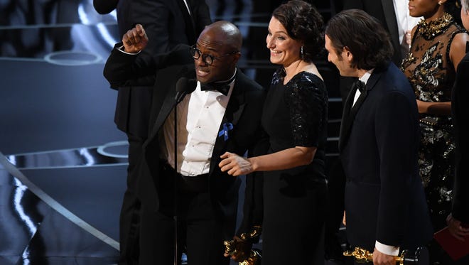 Barry Jenkins accepts the award for Best Picture for 'Moonlight' during the 89th Academy Awards.