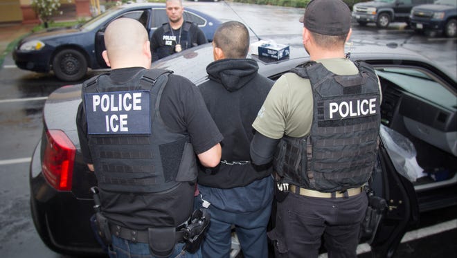 Immigration and Customs Enforcement officers arrest foreign nationals Feb. 7, 2017, during a targeted enforcement operation conducted aimed at immigration fugitives, re-entrants and at-large criminal aliens in Los Angeles.