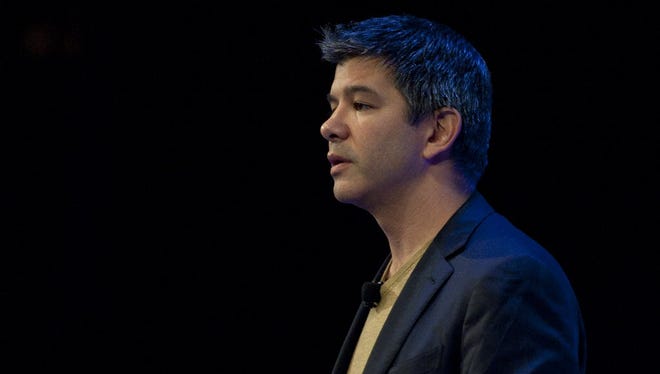 Travis Kalanick, CEO of Uber, delivers a speech in London October 3, 2014.
