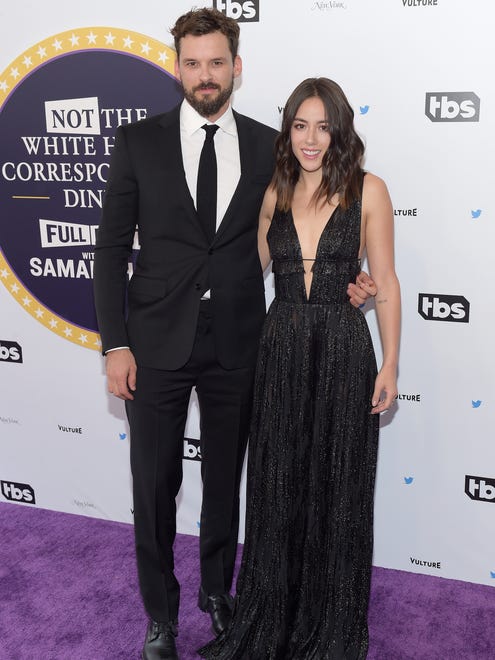 Austin Nichols, who starred on the just-concluded 'Bates Motel,' and 'Agents of S.H.I.E.L.D' actress Chloe Bennet work the purple carpet in tandem.
