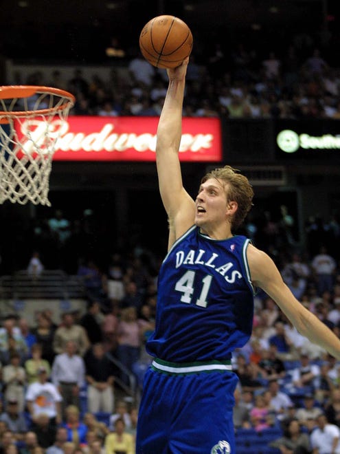 2001: Dirk Nowitzki of the Dallas Mavericks flies to the bucket for the dunk against the San Antonio Spurs.