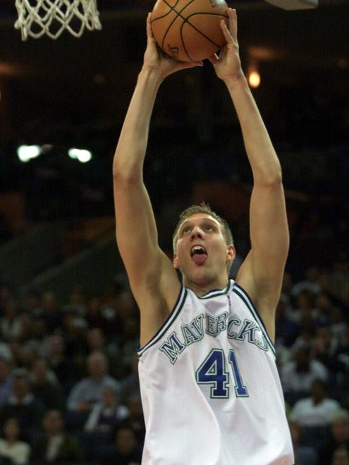 2000: Dallas' Dirk Nowitzki  goes to the hoop during the NBA Rookie Game.