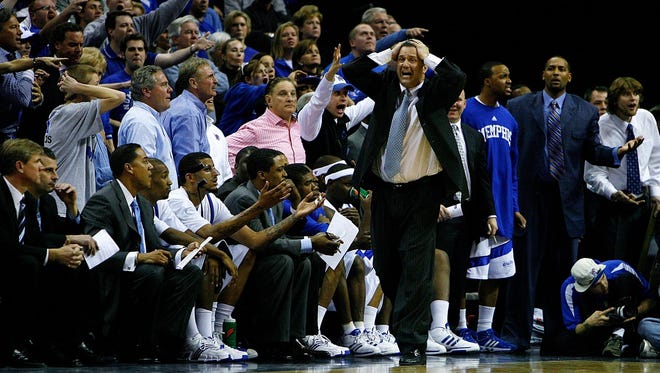 February 23, 2008 - Memphis head coach John Calipari ,right, reacts to an officials call during the final mintues of a 66-62 Tennessee victory.