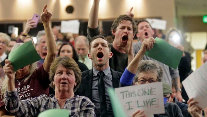 People shout to Rep. Jason Chaffetz during his town hall meeting on Feb. 9, 2017, in Cottonwood Heights, Utah. Republican members of Congress have faced angry constituents at town hall meetings.