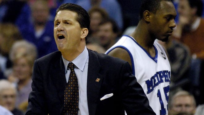 March 25, 2005  - Memphis coach John Calipari works the officals during a 81-68 victory over Vanderbilt during the NIT tournament.