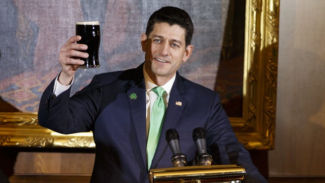 Paul Ryan holds up a pint of Guinness as he proposes a toast during the Friends of Ireland luncheon at the United States Capitol March 15, 2018 in Washington, DC. . The Taoiseach is visiting as part of the traditional St. Patrick's Day celebrations.