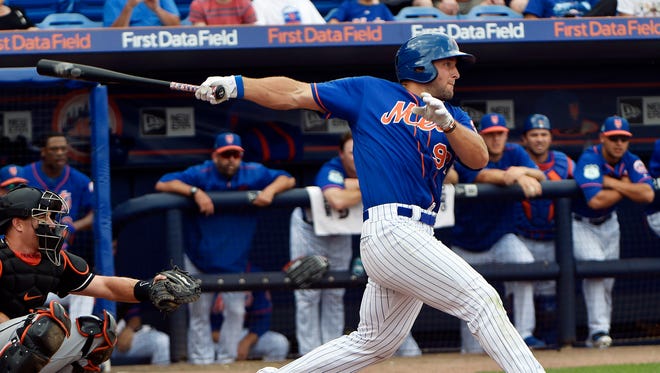 March 13: Tim Tebow gets his first hit of the spring off Miami's Kyle Lobestein.