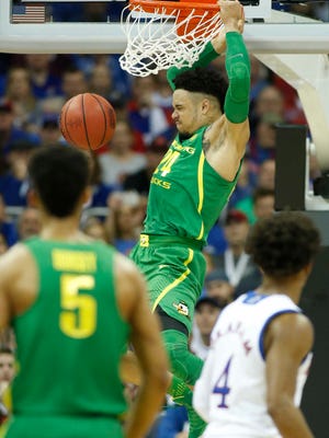 Oregon Ducks forward Dillon Brooks (24) dunks during the first half against the Kansas Jayhawks in the finals of the Midwest Regional of the 2017 NCAA Tournament at Sprint Center.