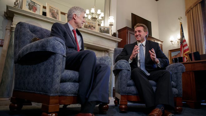 Gorsuch meets with Sen. Jeff Flake, R-Ariz., on Feb. 8, 2017, on Capitol Hill.