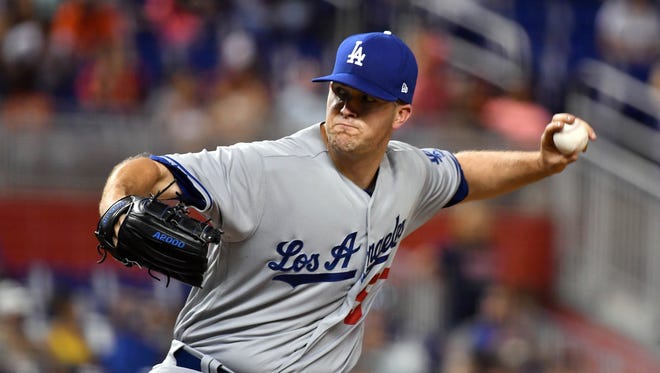 July 15: Alex Wood becomes first Dodger to open season with an 11-0 record after beating the Marlins. He tosses six innings of scoreless baseball, lowering his ERA to 1.56.