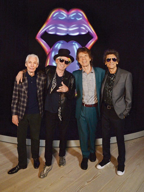 Charlie Watts, left, Keith Richards, Mick Jagger and Ronnie Wood of The Rolling Stones. 'Exhibitionism' runs in New York through March 12.