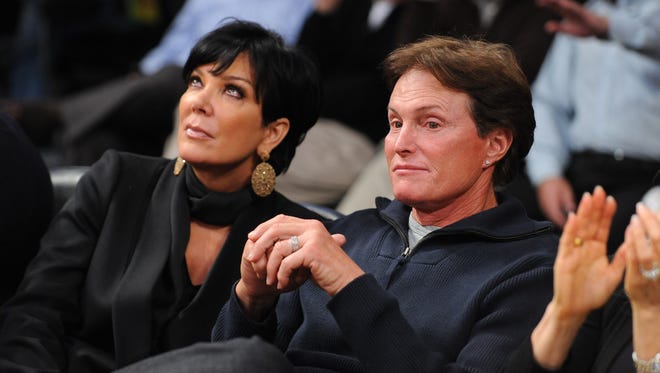 Kris and Bruce Jenner attend a game between the Dallas Mavericks and the Los Angeles Lakers at Staples Center on January 16, 2012 in Los Angeles, California. The pair decided to divorce after years of marriage.