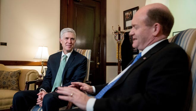 Gorsuch meets with Sen. Chris Coons, D-Del., on Capitol Hill on Feb. 14, 2017.