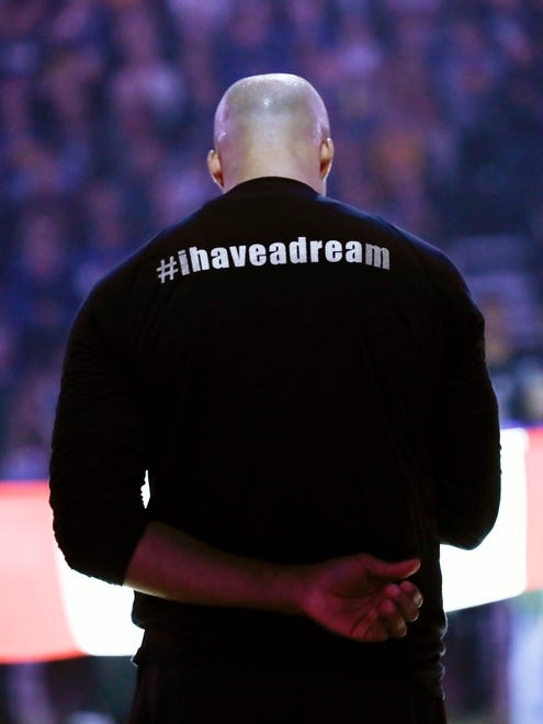 Cavaliers forward Richard Jefferson stands during the national anthem while wearing an 'I have a dream' shirt to honor the late Dr. Martin Luther King Jr.