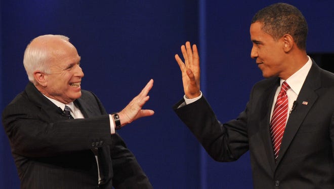 Obama and McCain greet each other at Hofstra University at the end of their third and final presidential debate on Oct. 15, 2008, in Hempstead, N.Y.