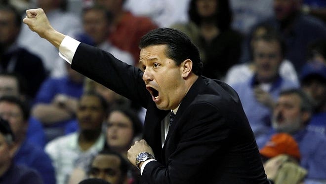 March 9, 2007 - Memphis head coach John Calipari screams at his players during first half action at thier Conference USA tournament game.