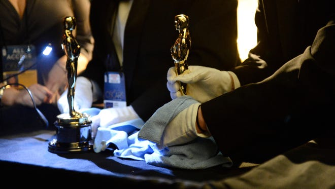 The Oscars receive white-glove treatment and security backstage. The winners ' engraved plates wait at the Governors Ball. " They see their name put on the Oscar, and it ' s emotional, " says Randy Haberkamp, official Oscar historian.